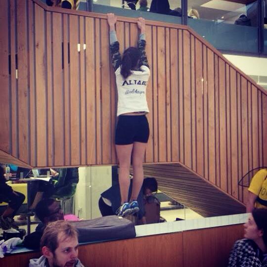 Ali smashes out some chin ups in the Forum during campaign week