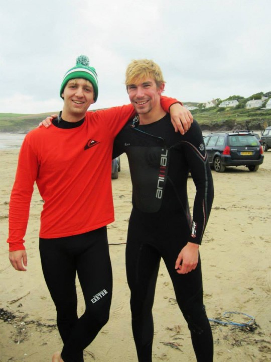 Andy (left) enjoying the surf