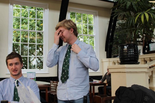 Harry doesn't look best pleased with his new EUMHC tie