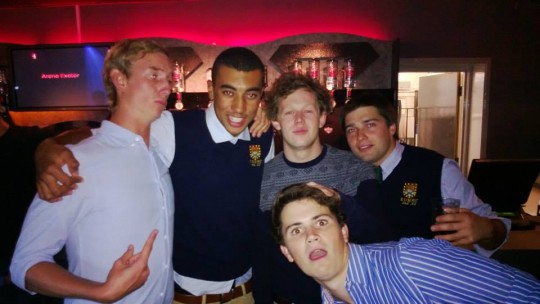 Appleby (black and white jumper) alongside some of his comrades. It remains unclear whether we will miss him or his lid the most.
