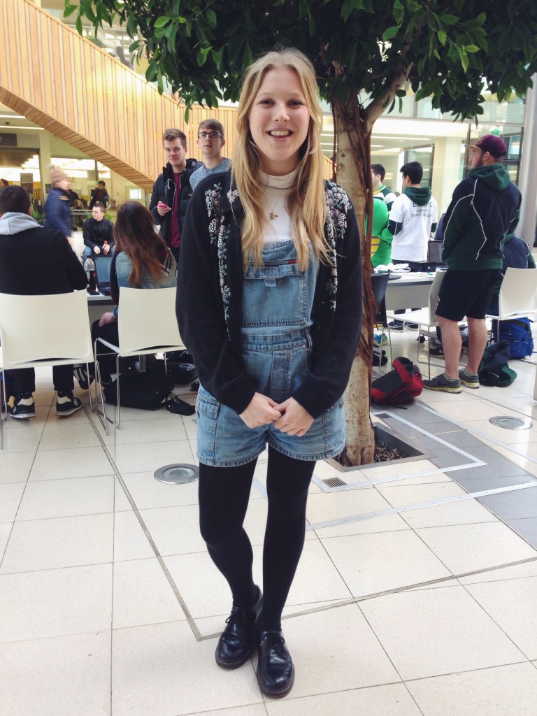 We love how Poppy styles up these denim dungarees with a turtle neck & vintage cardigan!