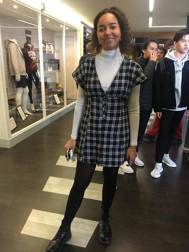 Image may contain: Female, Long Sleeve, Coat, Suit, Overcoat, Sleeve, Person, Human, Clothing, Apparel, Shoe, Footwear