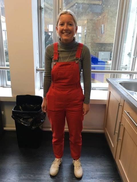 Image may contain: Room, Apron, Indoors, Home Decor, Clothing, Apparel, Person, Human