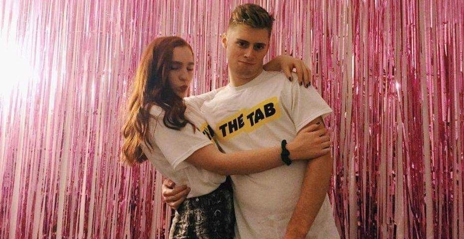 Image may contain: Skin, Word, Home Decor, Face, Shirt, Person, Human, Apparel, Clothing