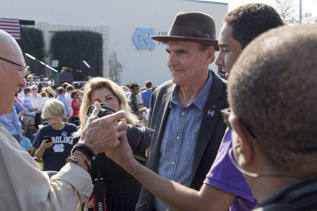 James Taylor and wife, Kim Taylor, speak to press at Obama Rally. Photo: Brenna Elmore / The Tab
