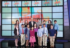 Photo courtesy of Jeopardy Productions Inc. - Plano student Neil Patel, far right, poses with fellow contestants and 'Jeopardy!' host Alex Trebek during 'Kids Week.'