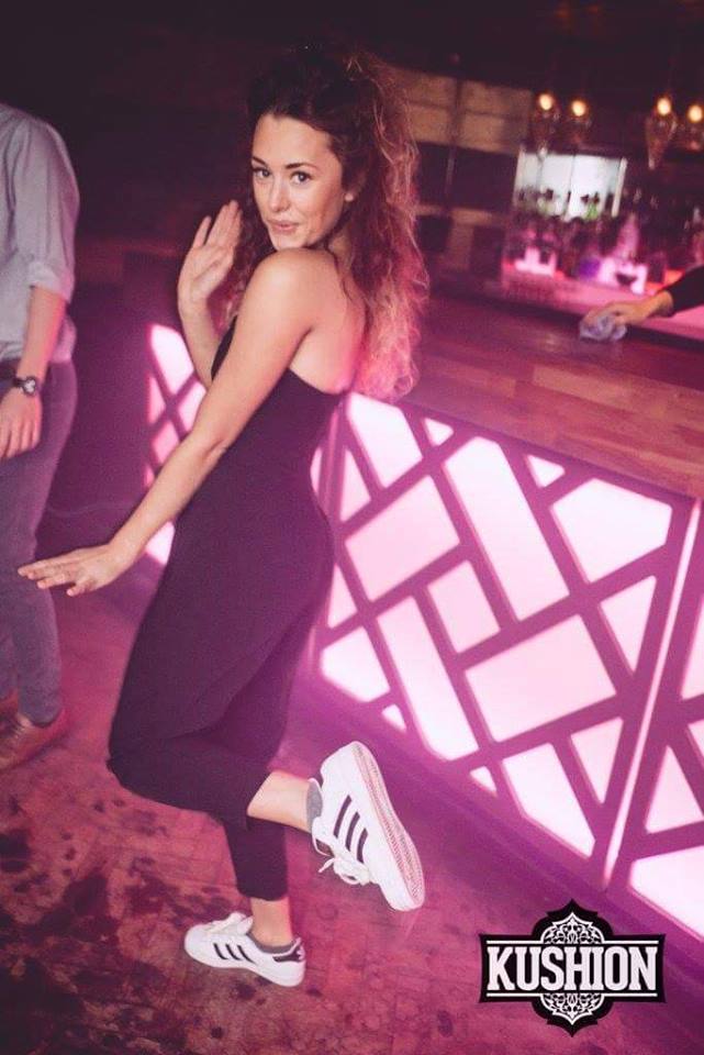 how does she rock the long dress and trainers so well?