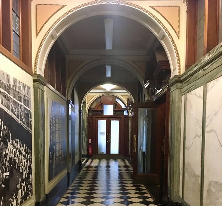 Image may contain: Architecture, Building, Flooring, Floor, Corridor