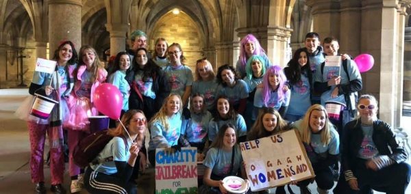 Image may contain: Parade, People, Crowd, Accessory, Accessories, Sunglasses, Human, Person