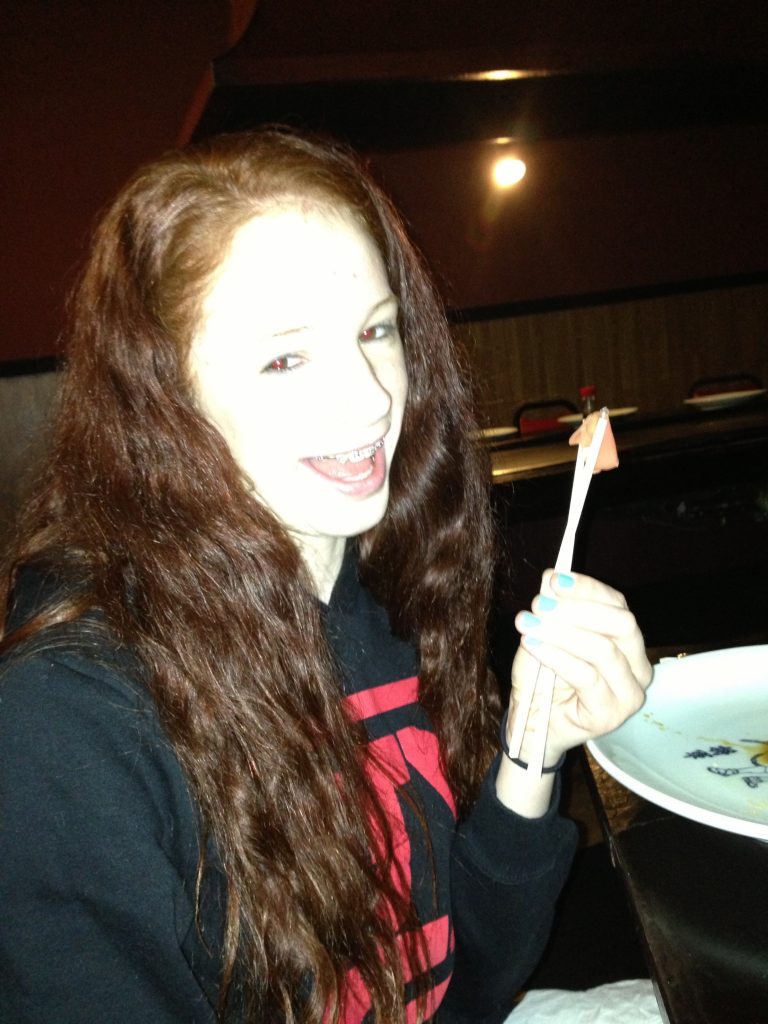 A cheesy ginger holding ginger