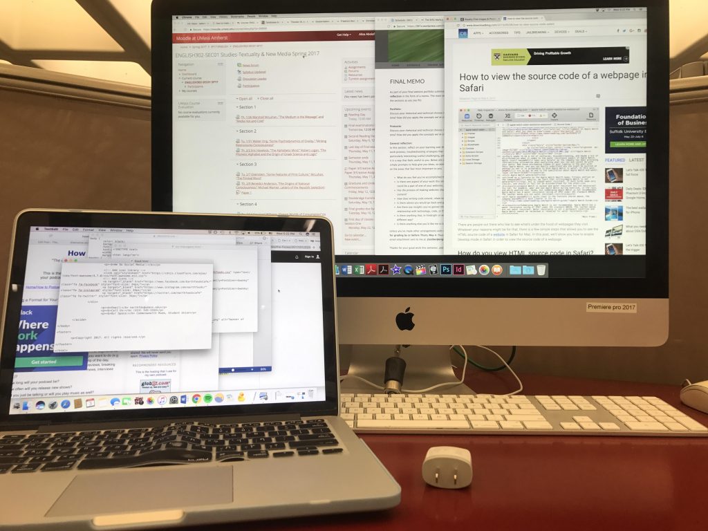alternative studying desktop computer next to a laptop computer filled with browser windows and tabs