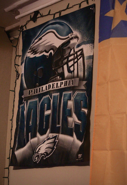An Eagles flag hangs on the wall in Giampa's room.