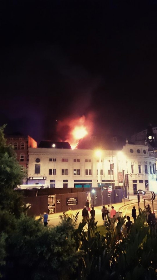 Flames rising over the city centre
