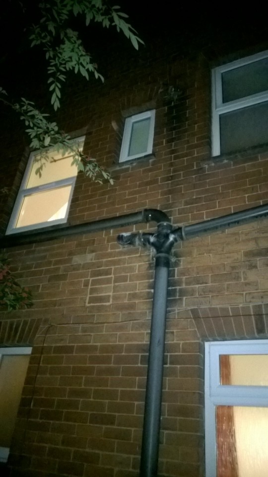 Burglars scaled the drainpipe and squeezed through the tiny middle window