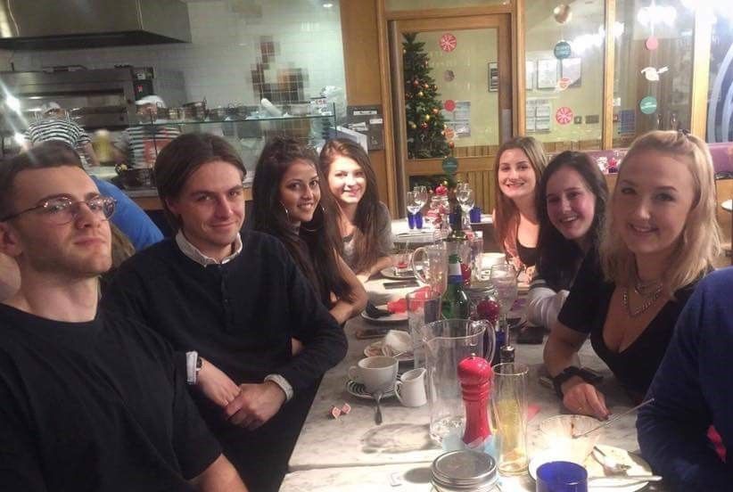 Image may contain: Glass, Restaurant, Bottle, Person, People, Human