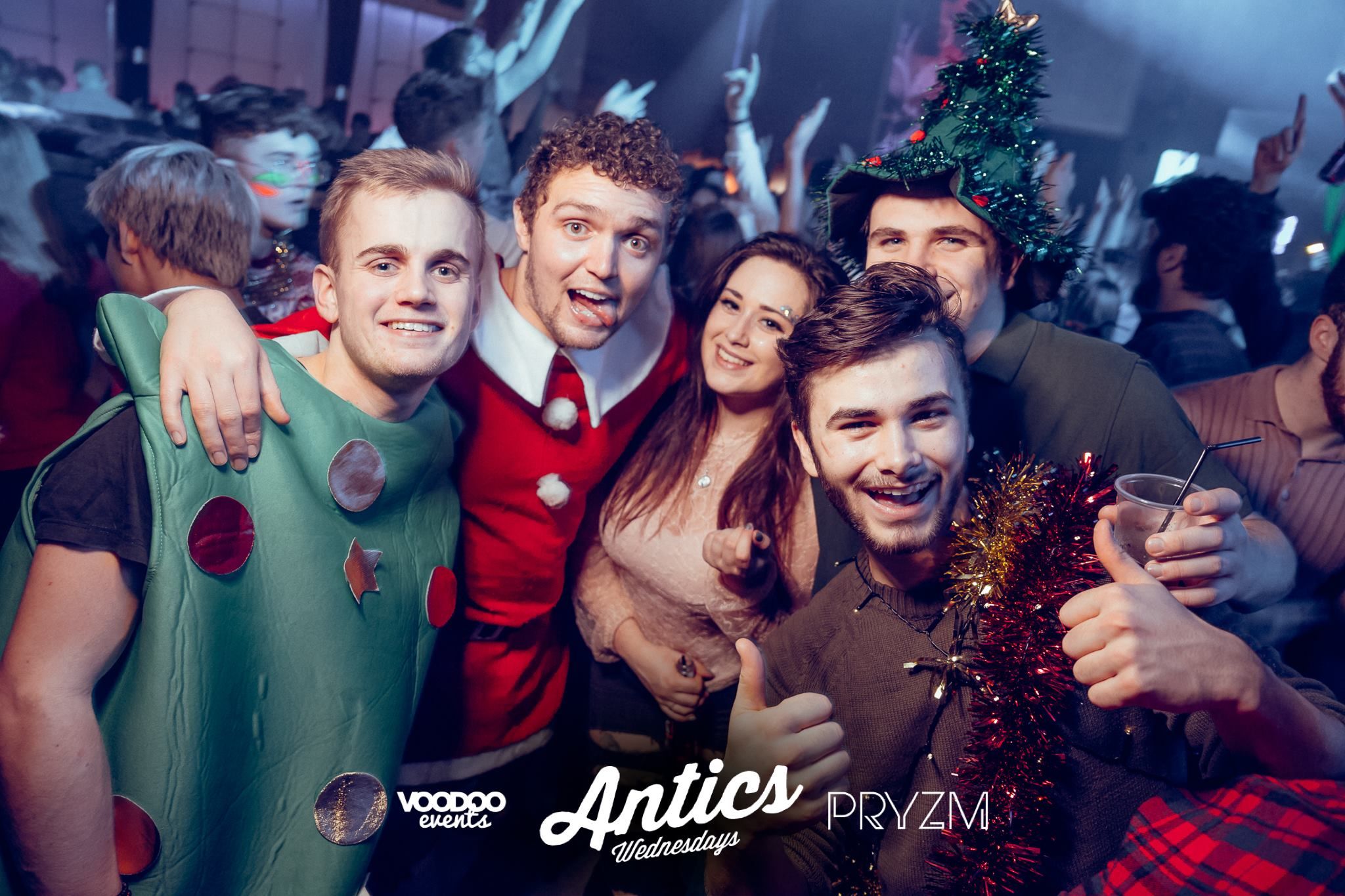 Image may contain: Drink, Beverage, Crowd, Glass, Music, Leisure Activities, Person, People, Human