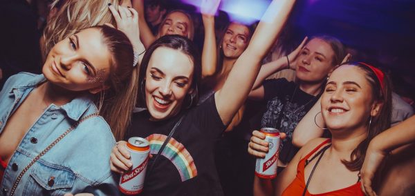 Image may contain: Drink, Beverage, Party, Person, Human