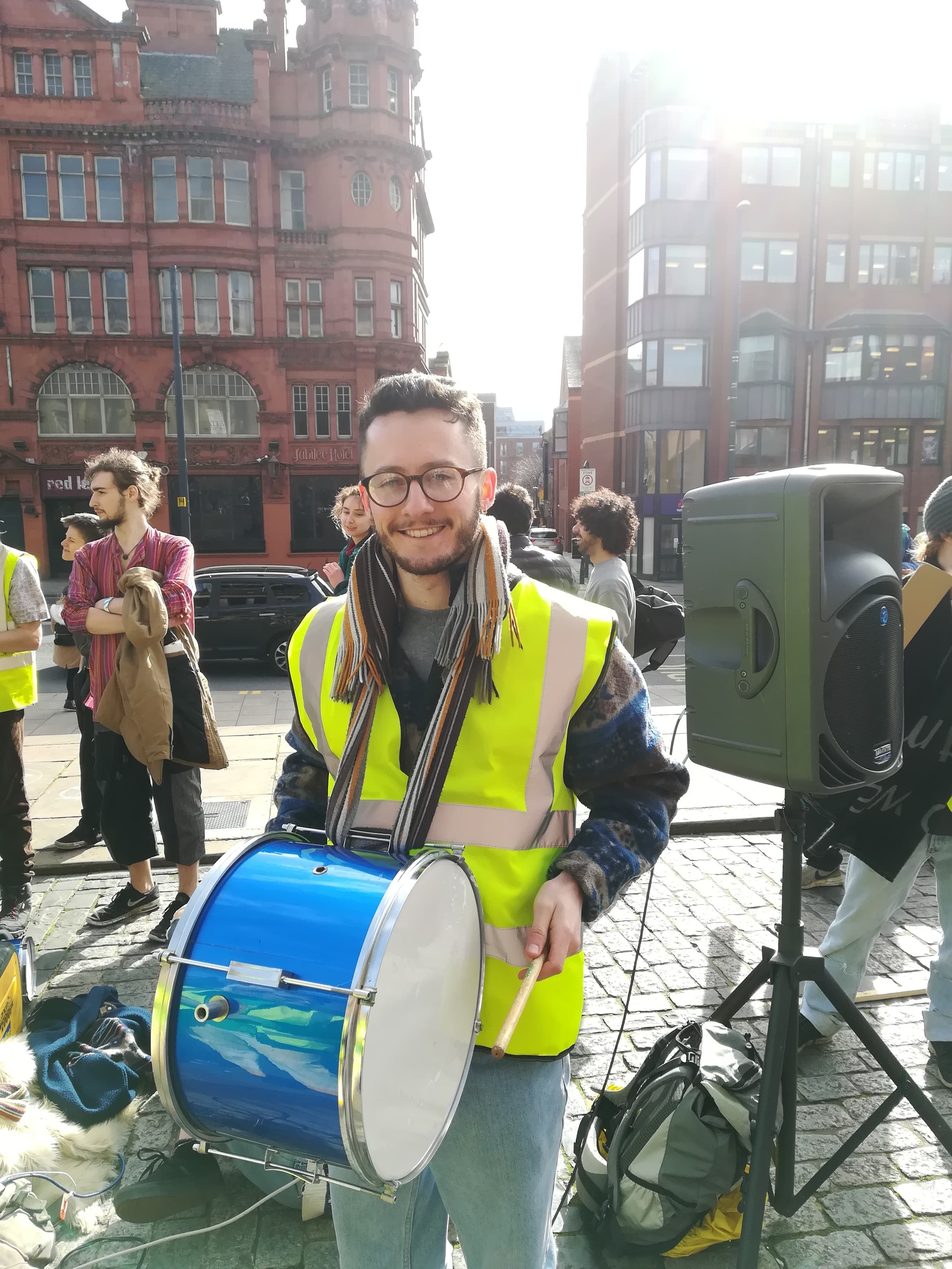 Image may contain: Accessory, Glasses, Accessories, Drummer, Drum, Percussion, Musical Instrument, Musician, Person, Human