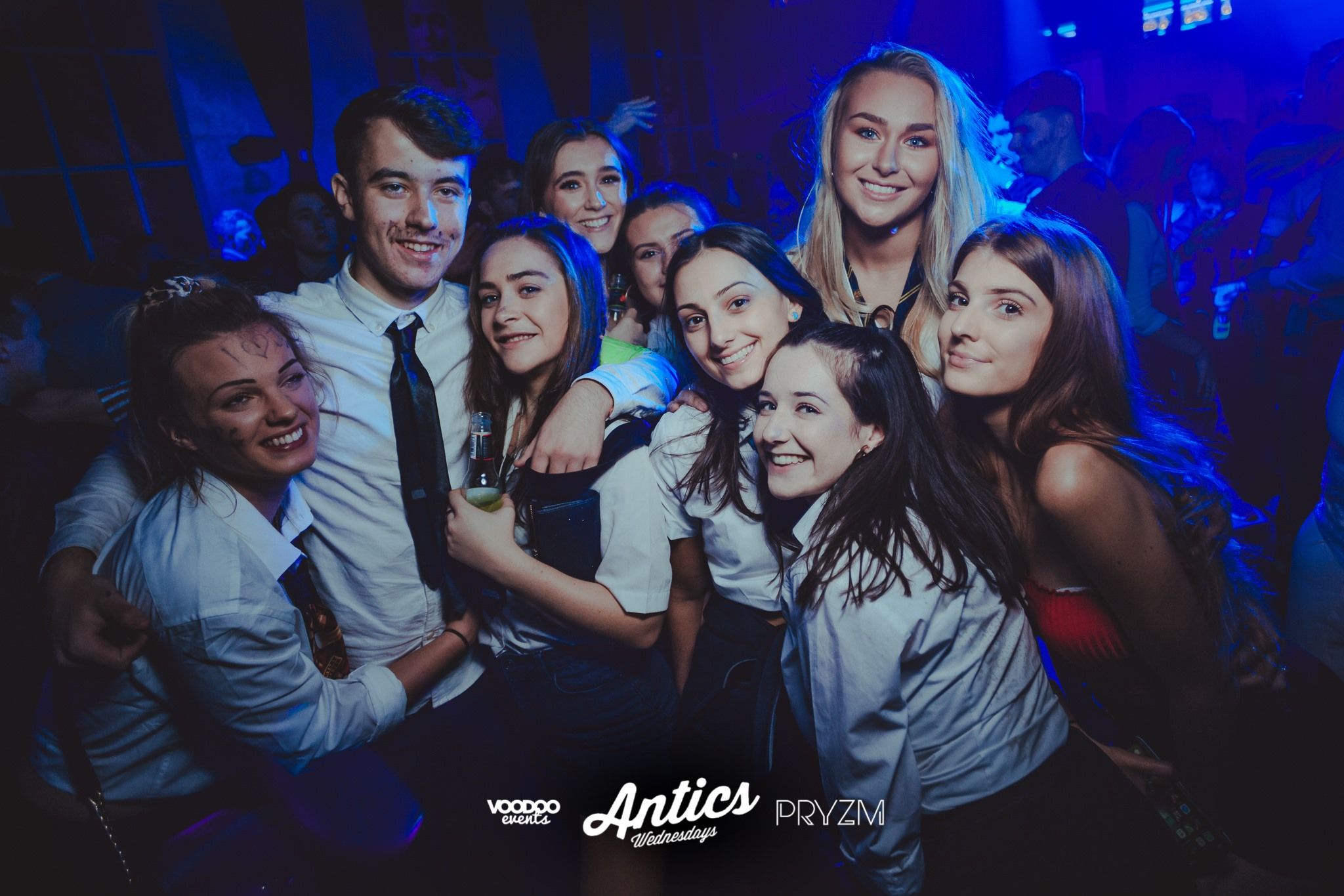 Image may contain: Night Life, Disco, Tie, Accessory, Accessories, Night Club, Club, Party, Person, Human