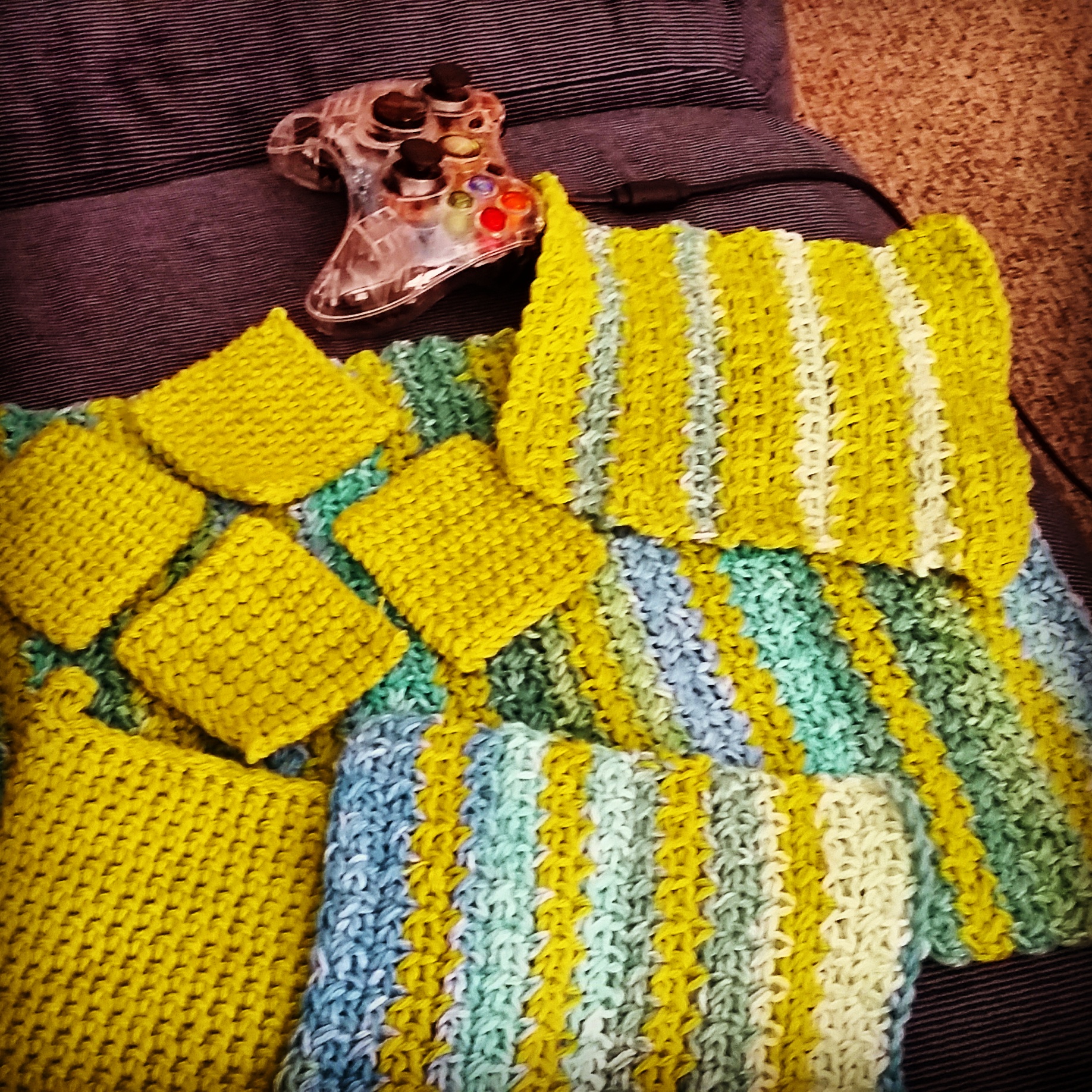 A set of 4 coasters, 2 wash cloths, a dish towel, and a pot holder I made.