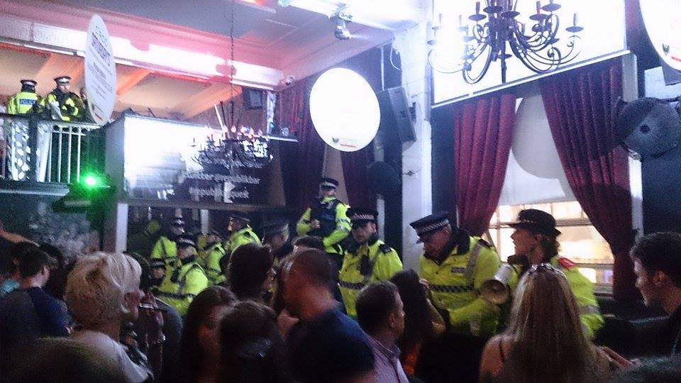 Policemen swarmed the dancefloor