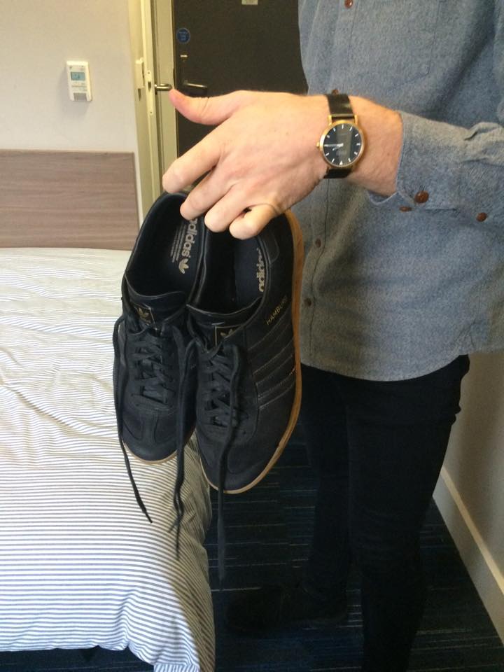 The leather on these Adidas originals was originally (lol) orange, but George's gf customised them black herself. Keeper.