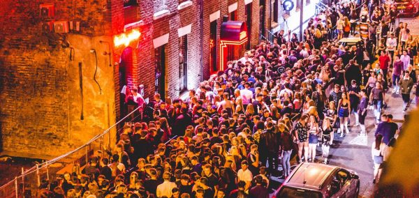 Image may contain: Performer, Musician, Musical Instrument, Music Band, Music, Leisure Activities, Person, Human, Crowd