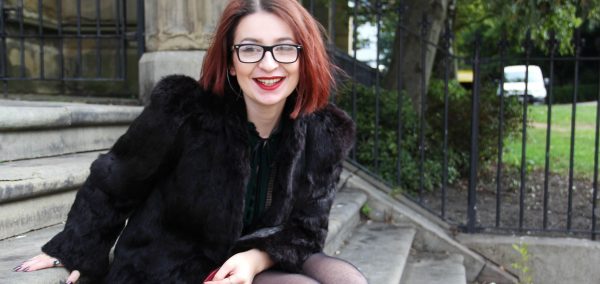 Image may contain: Female, Shoe, Long Sleeve, Overcoat, Sleeve, Footwear, Jacket, Coat, Human, Person, Accessories, Accessory, Glasses, Apparel, Clothing