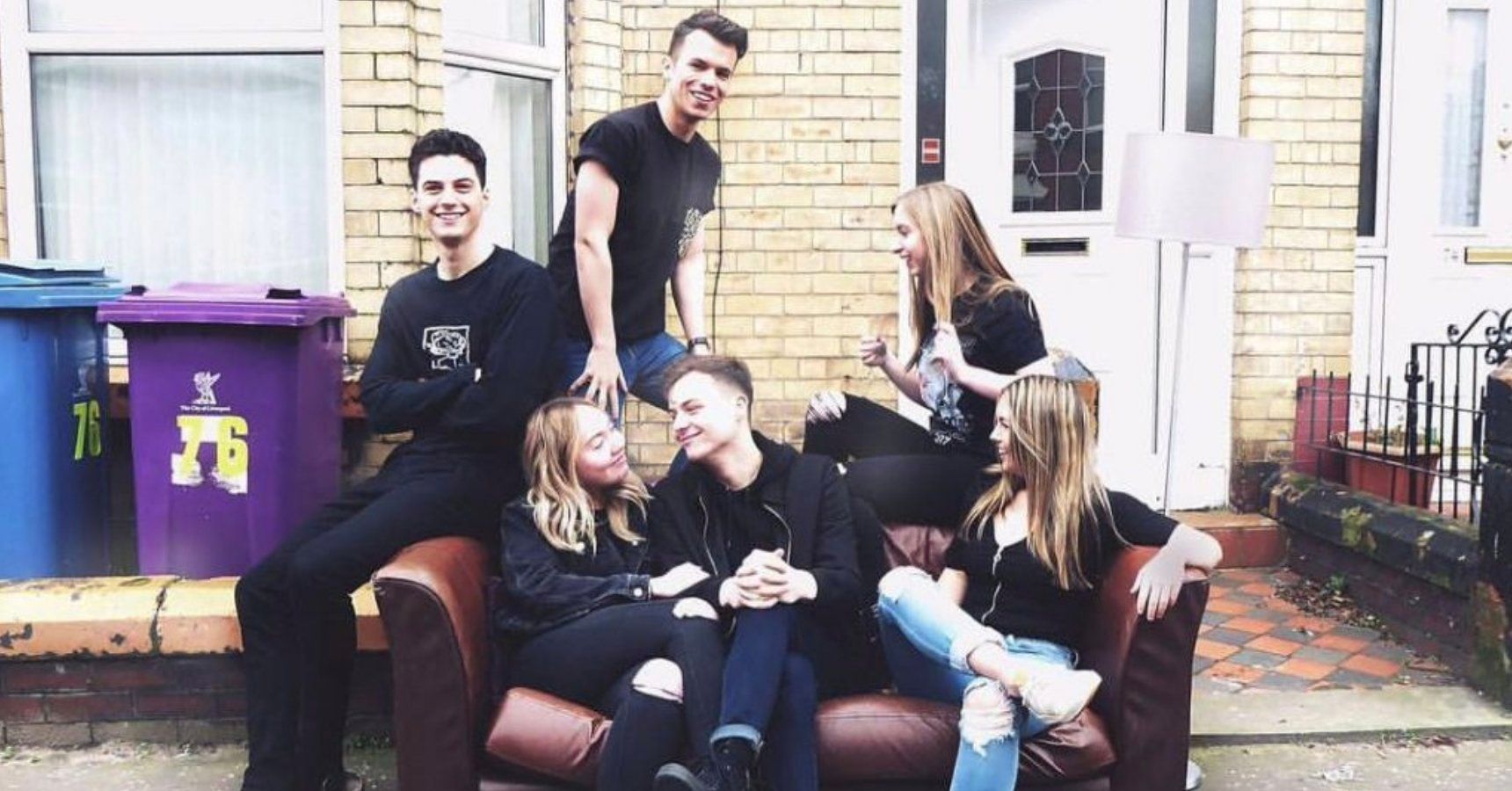 Image may contain: Sitting, Room, Indoors, Denim, Jeans, Costume, People, Crowd, Couch, Furniture, Pants, Apparel, Clothing, Person, Human