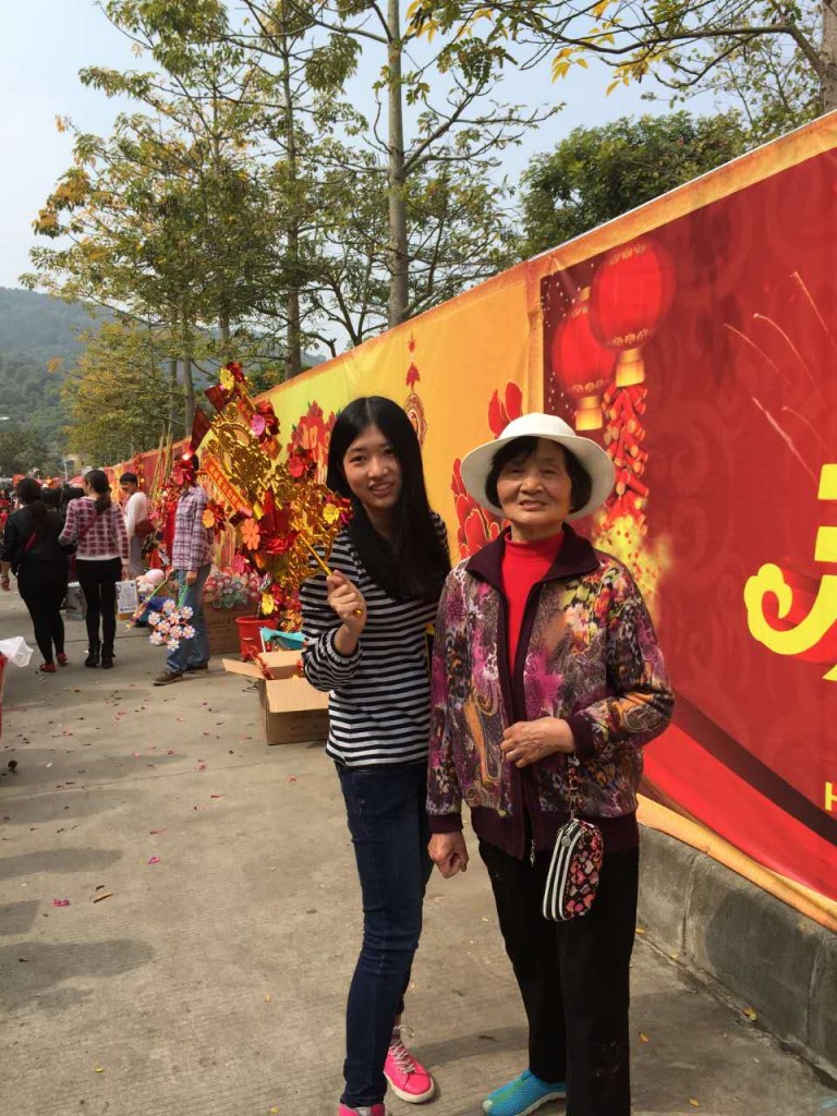 Me and my grandmother at the Flower Fair. A shirt and jeans is enough for the winter.