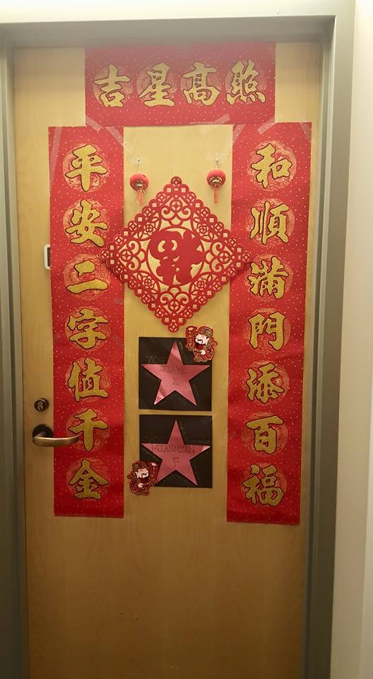 I decorated the door of my room with Chinese couplets I brought from home during the Lunar New Year.