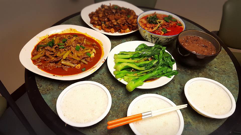 I cooked Chinese food with my friends on the Lunar New Year's Eve.