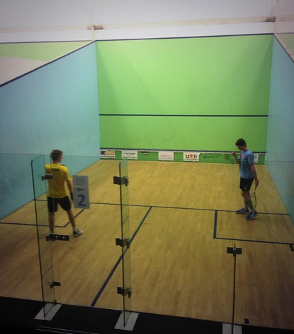 A UC player celebrating a win over former top 30 world player Chris Ryder. (Photo from @UCLUSquashClub)