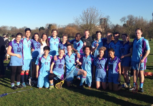 The team pose for a celebratory photo after the match
