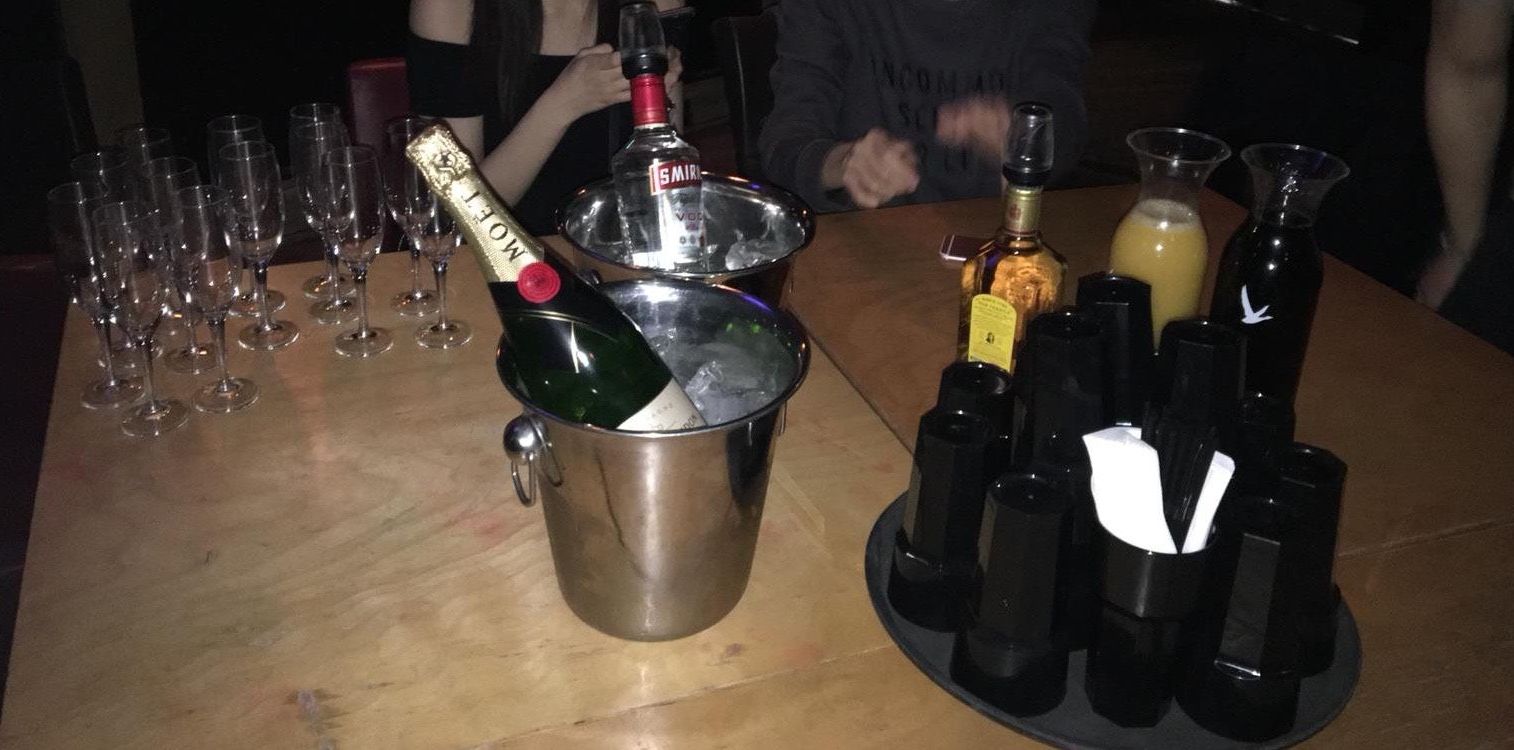 Image may contain: Wine Bottle, Beer Bottle, Stout, Wine, Beer, Beverage, Drink, Alcohol, Bottle, Person, Human