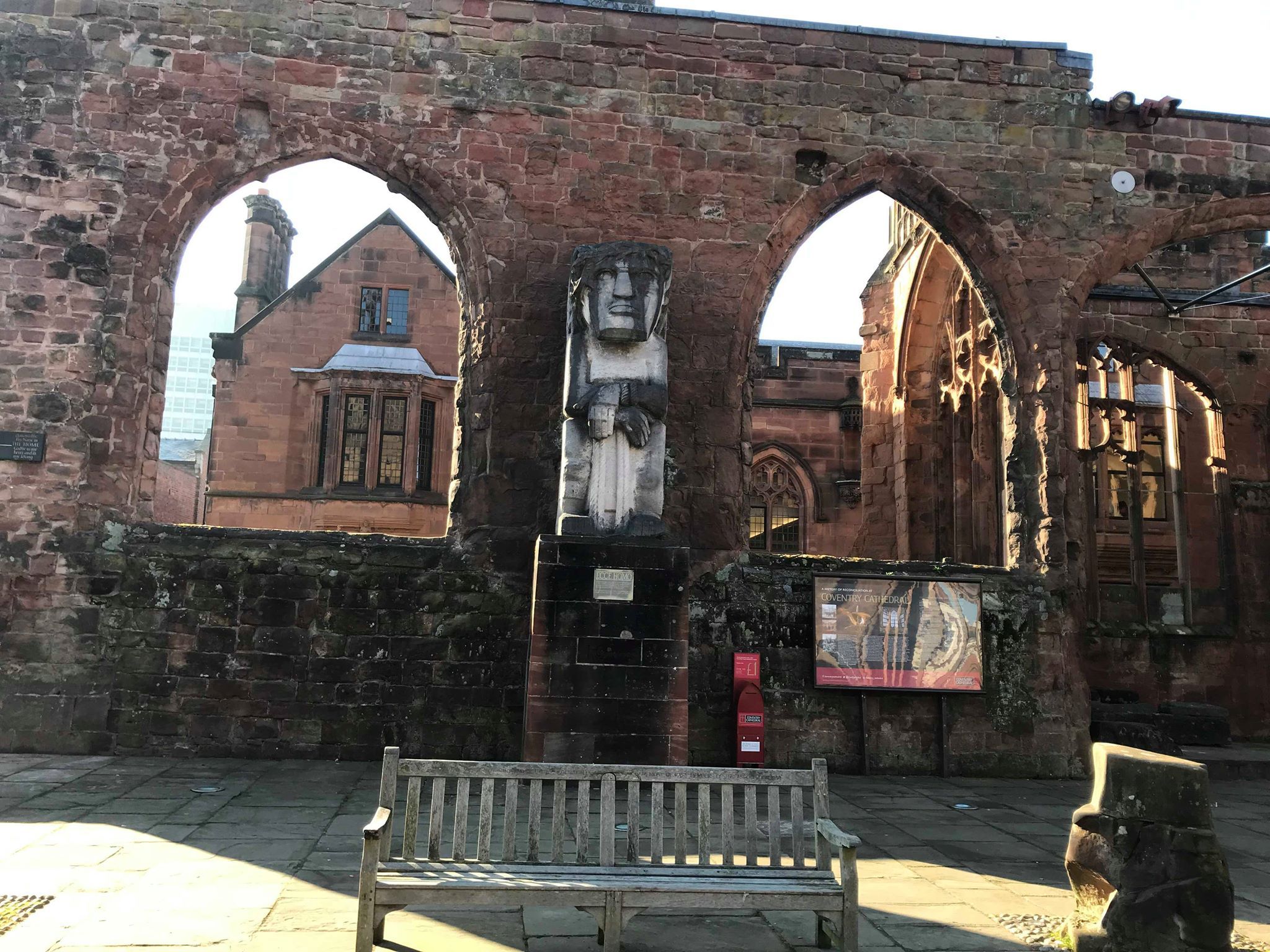 Image may contain: Sitting, Arched, Arch, Park Bench, Bench, Architecture, Building, Furniture