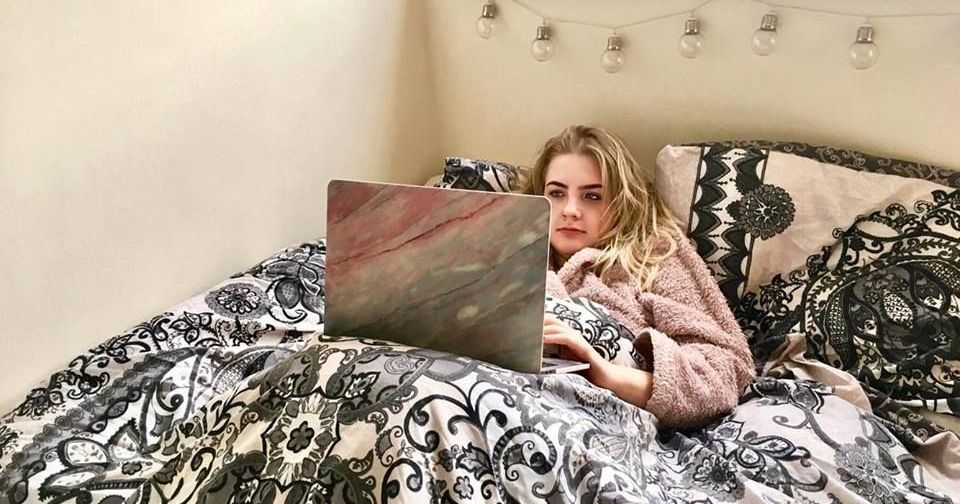 Image may contain: Face, Female, Bed, Home Decor, Furniture, Dorm Room, Heel, Person, Human, Indoors, Room, Bedroom, Pillow, Cushion