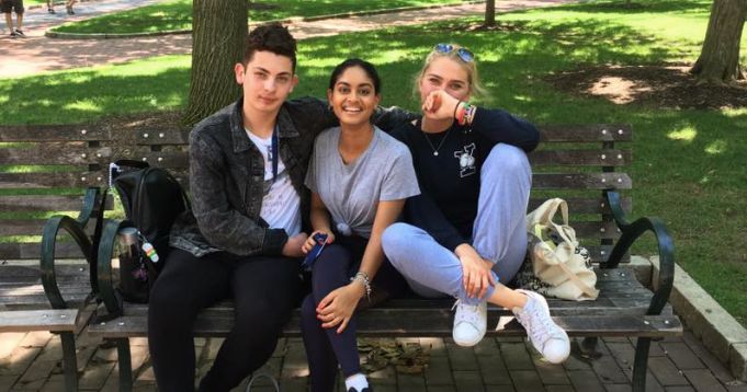 Image may contain: Girl, Face, Bench, Lawn, Park, Outdoors, Shoe, Footwear, People, Female, Furniture, Plant, Grass, Jeans, Denim, Pants, Clothing, Apparel, Person, Human