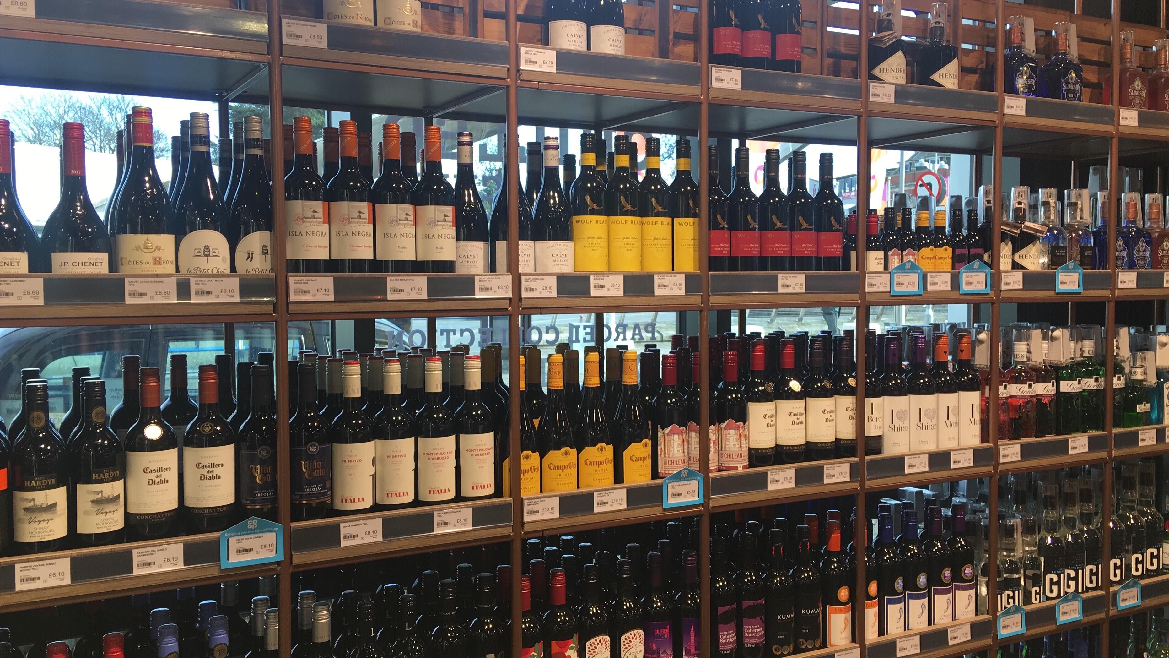 Image may contain: Shelf, Beer, Wine Bottle, Bottle, Drink, Beverage, Wine, Alcohol