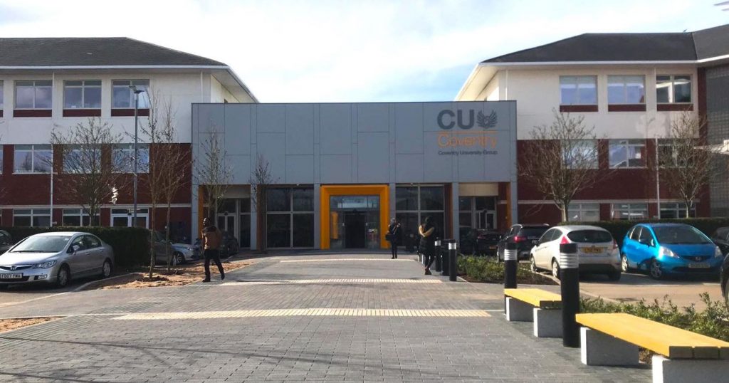 Image may contain: Urban, Road, Furniture, Bench, Building, Office Building, Machine, Wheel, Car, Transportation, Automobile, Vehicle, Human, Person