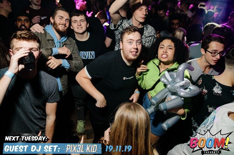 Image may contain: Night Club, People, Interior Design, Indoors, Camera, Electronics, Club, Face, Night Life, Audience, Crowd, Party, Person, Human