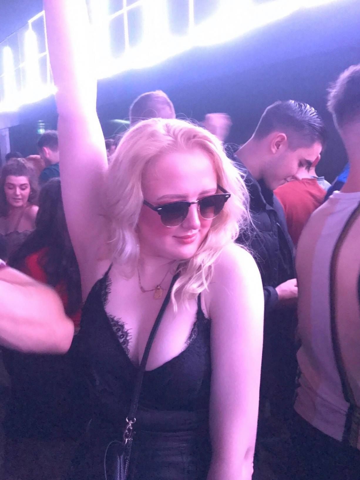 Image may contain: Night Life, Night Club, Club, Party, Human, Person, Accessories, Sunglasses, Accessory