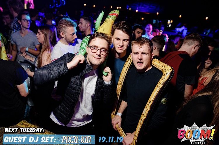 Image may contain: People, Musician, Musical Instrument, Music Band, Leisure Activities, Crowd, Face, Apparel, Clothing, Night Club, Club, Person, Human, Party