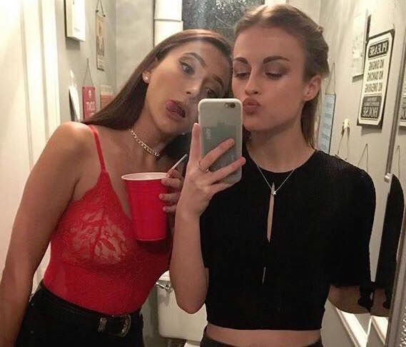 Image may contain: Face, Mobile Phone, Electronics, Cell Phone, Phone, Person, Human