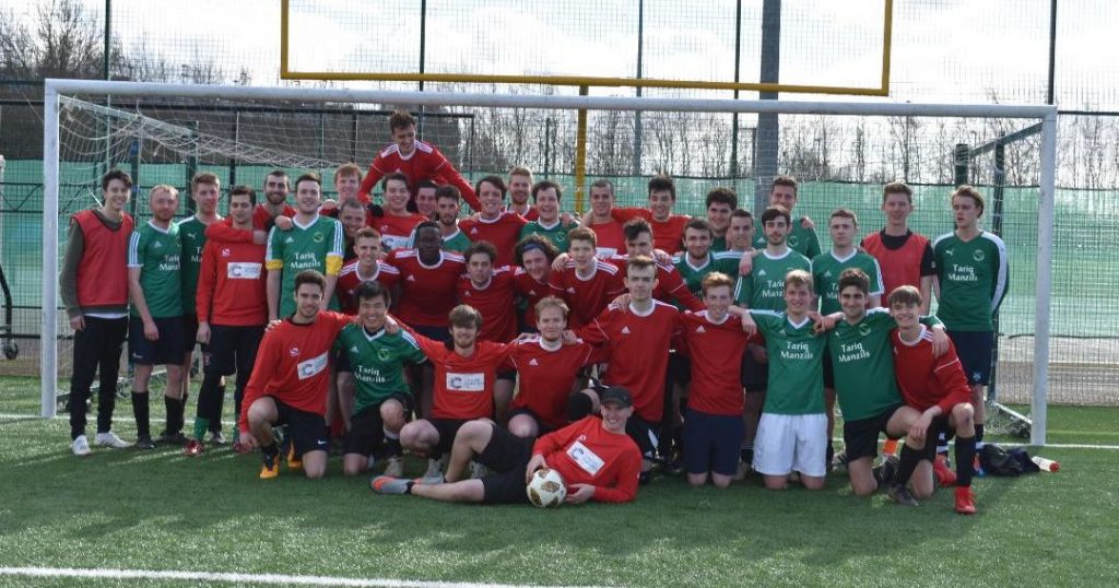 Image may contain: Footwear, Shoe, Apparel, Clothing, Football, Team, Team Sport, Sports, Sport, People, Person, Human