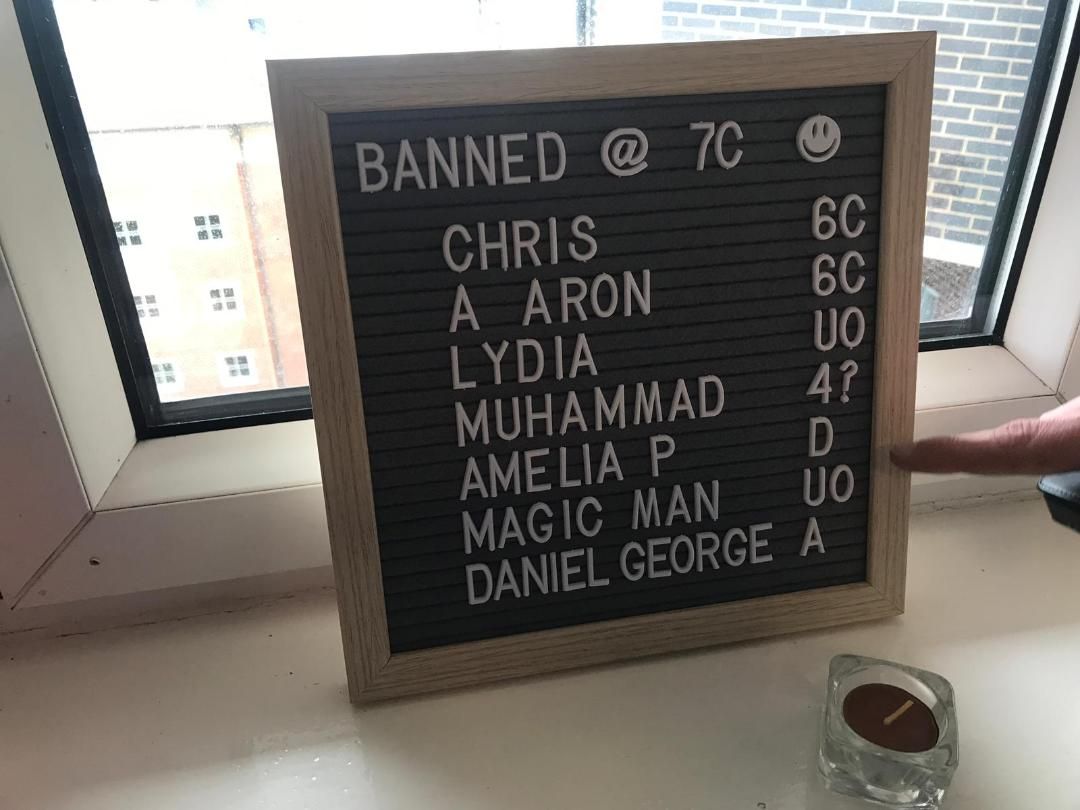 Image may contain: Text, Human, Person, Blackboard