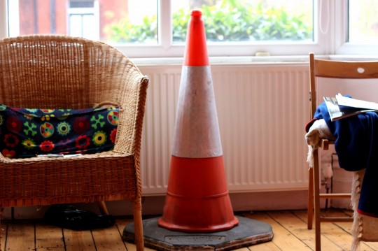 Police leaned on this cone as they took statements.