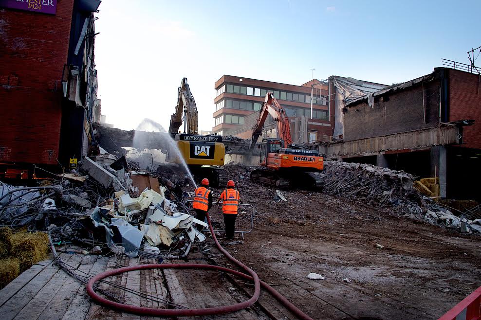 The workmen celebrated when the historic bridge was felled