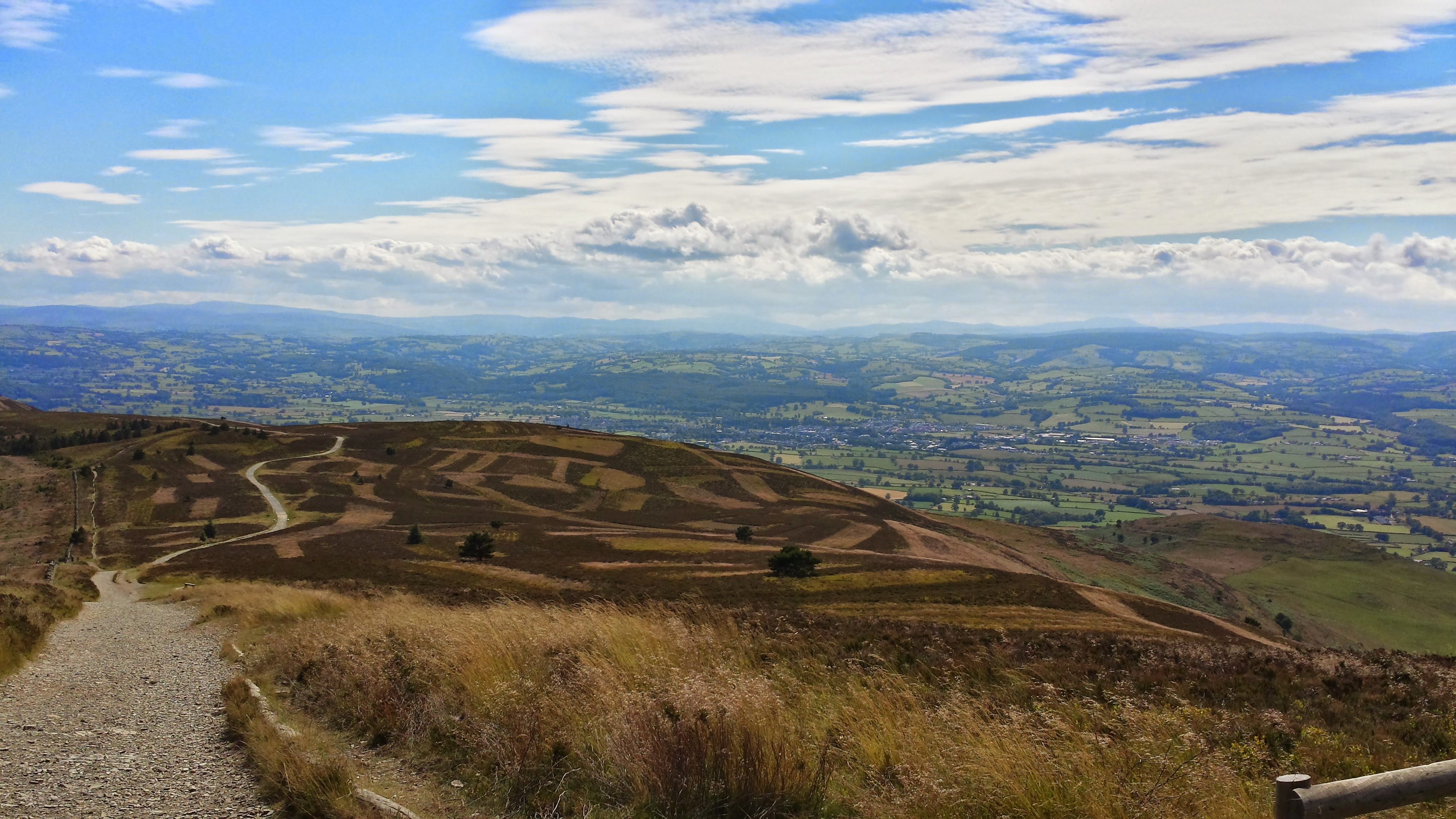 Image may contain: Nature, Hill, Countryside, Outdoors, Grassland, Field