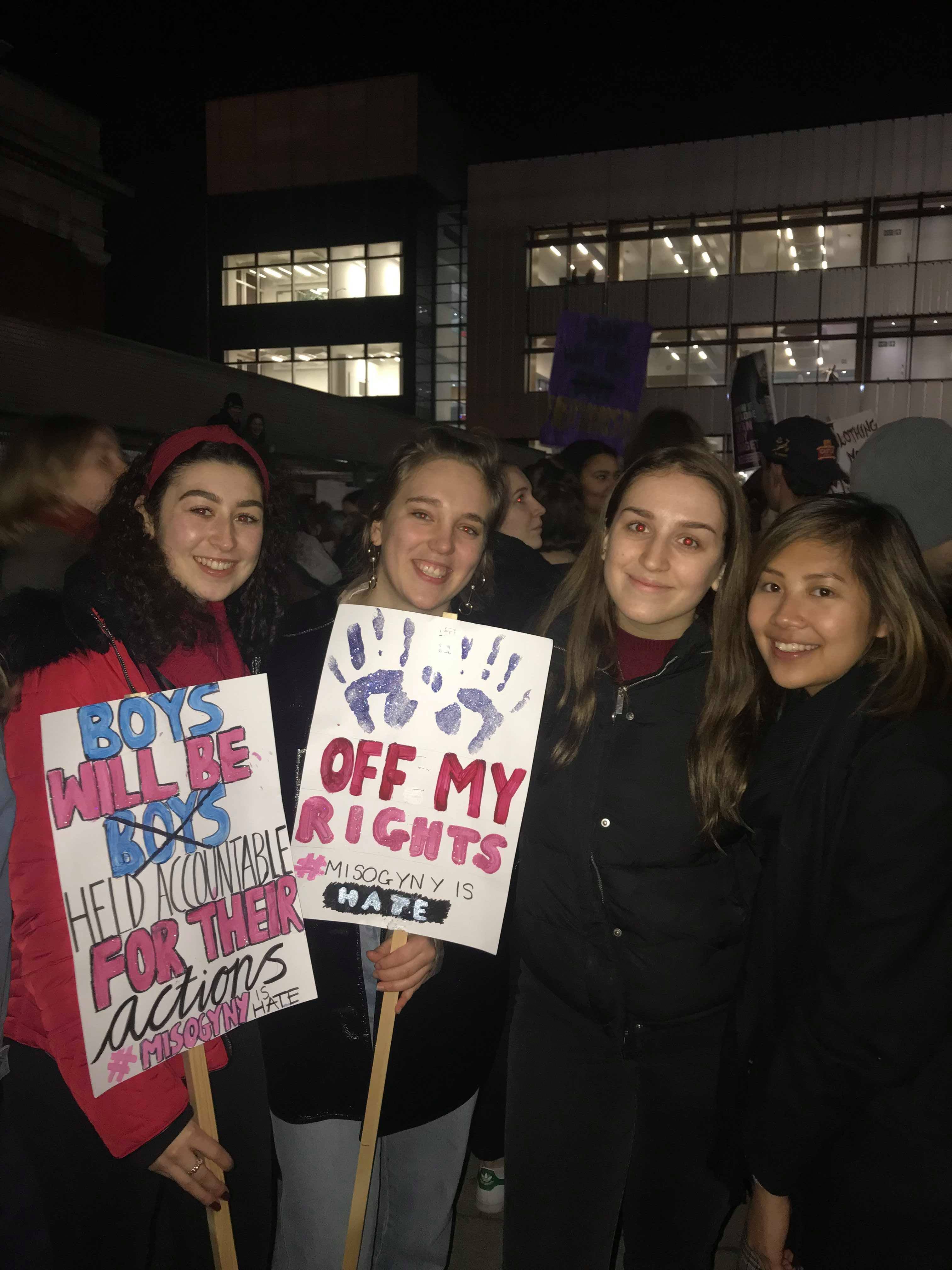 Image may contain: Banner, Word, Crowd, Text, Person, Human